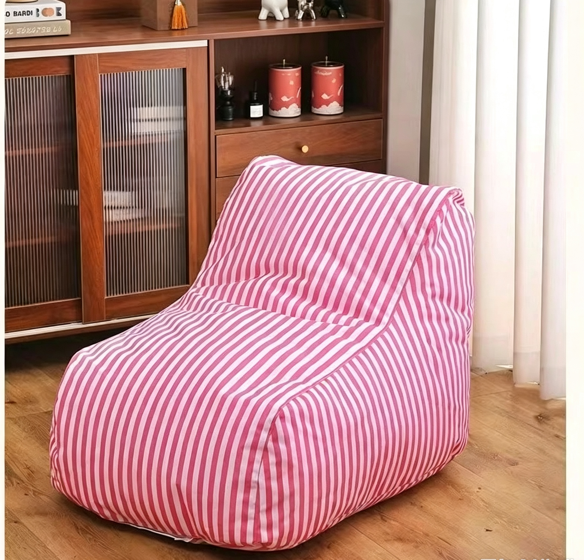 orange bean bag chair beach scene